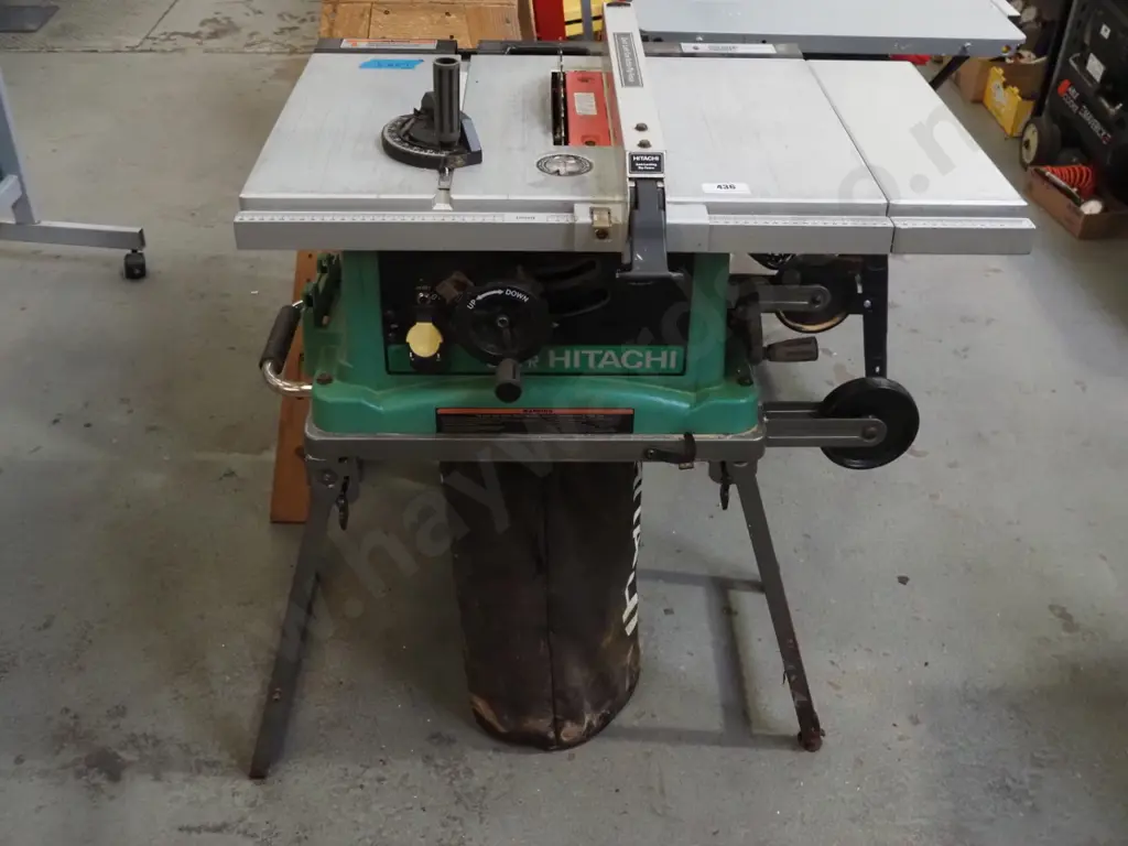 Hitachi bench saw on foldaway trolley stand Image 1++