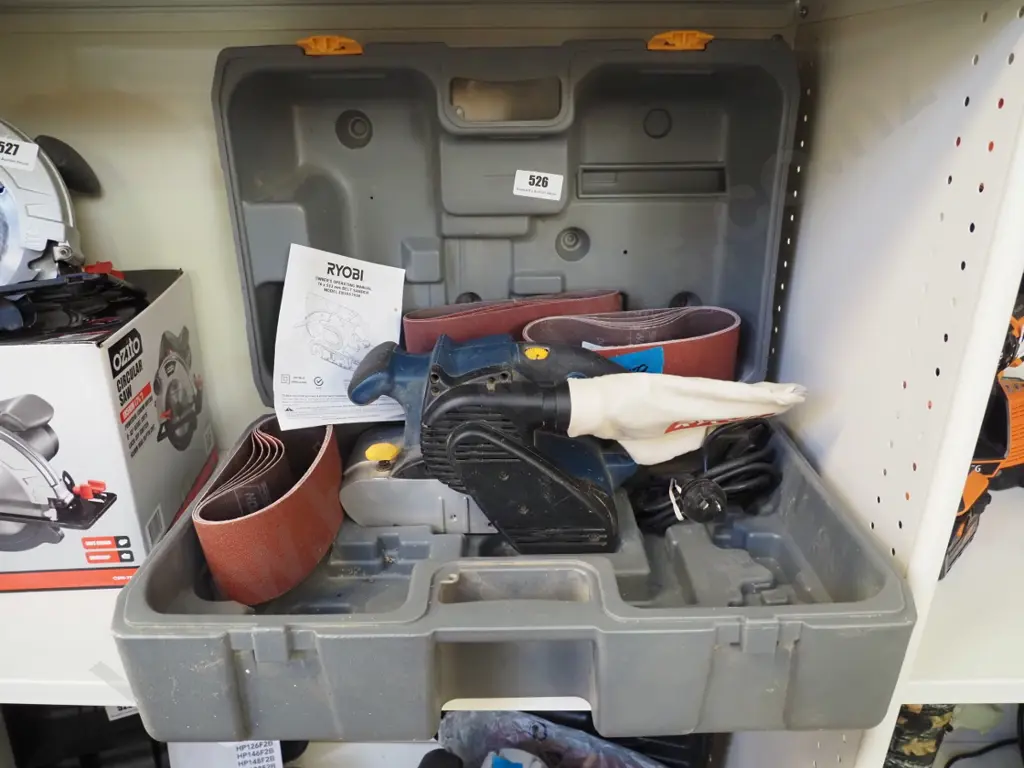 large Ryobi belt sander with extra belts and carry case Image 1++