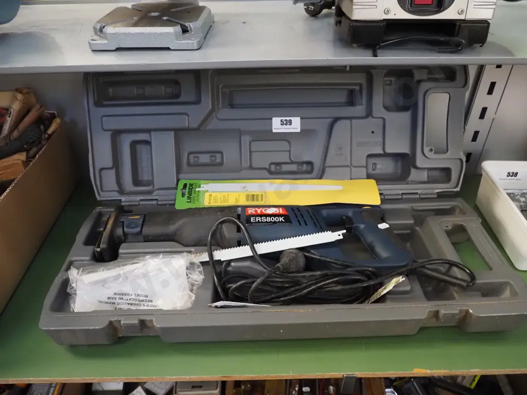 cased Ryobi reciprocating saw Image 1++