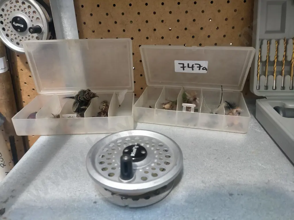 fly fishing reel and 2 containers of flies Image 1++