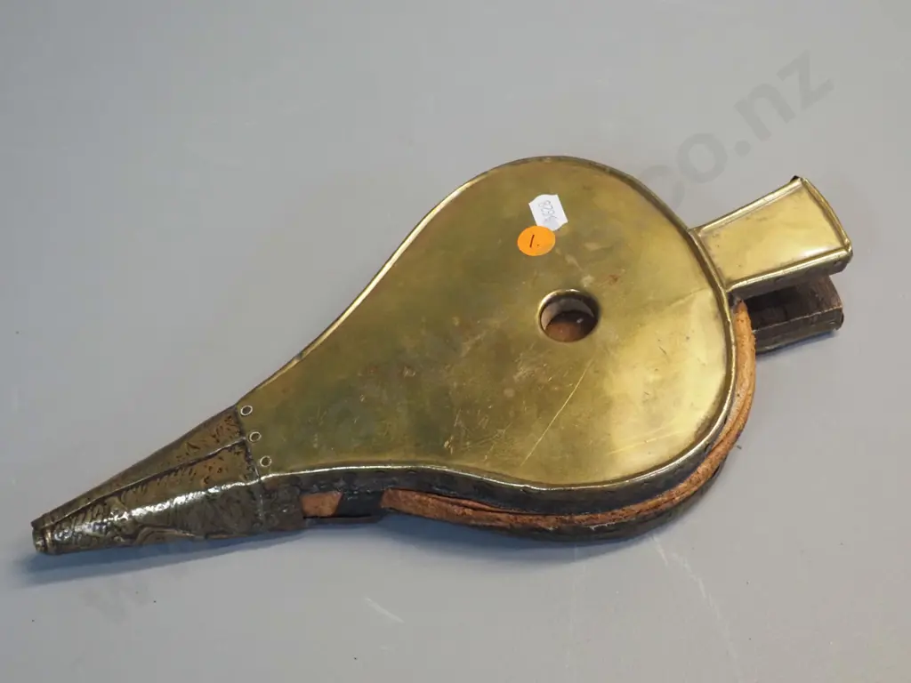 vintage timber, leather and brass bellows with pressed brass figural design on one side L-310 W-150 Image 1++