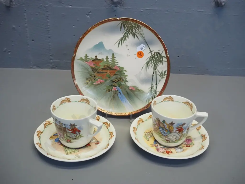 2 Royal Doulton Bunnykins cups & saucers and a Satsuma small display plate D-190 Image 1++