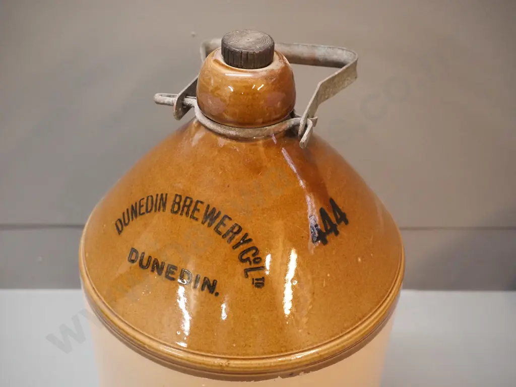 narrow-mouth stoneware crock with metal handle & threaded stopper - marked Dunedin Brewery Co. Ltd Dunedin, 444. Image 1++