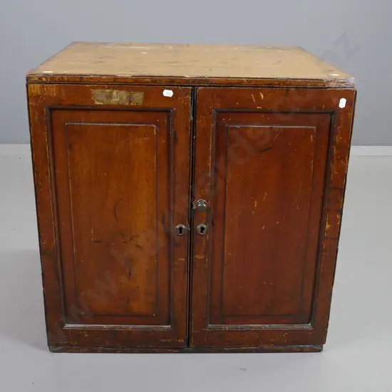 oak 2-door Masonic chest with 6 internal drawers, top one lined and divided, brass lock and escutcheons, panelled door