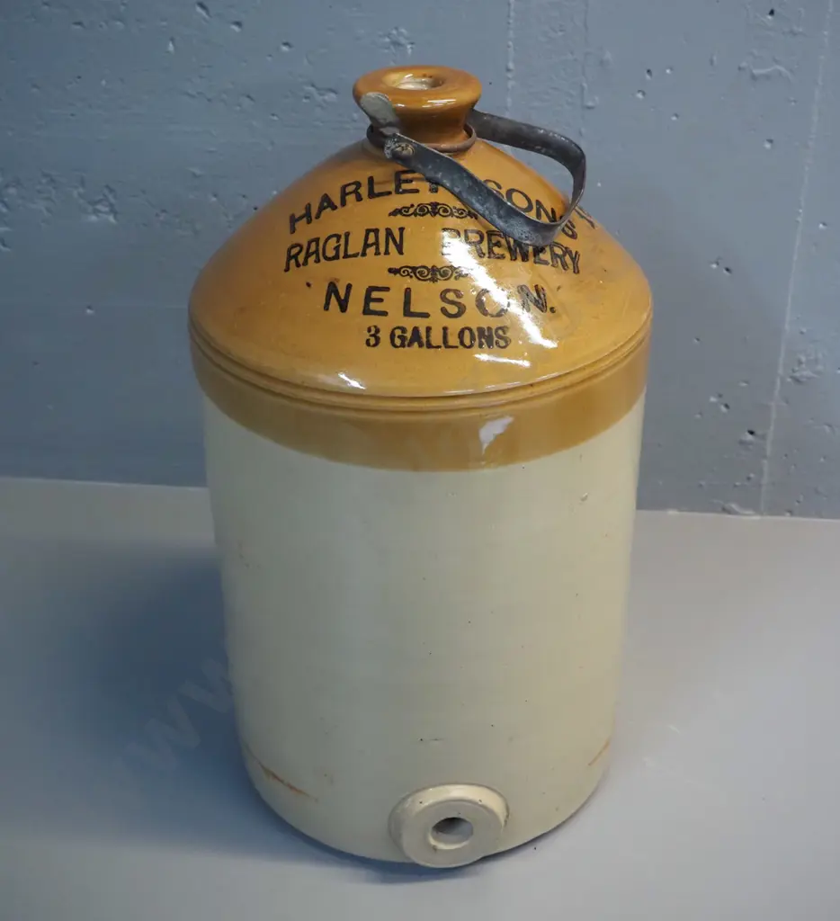 large narrow-mouth stoneware crock w/ metal handle - marked Harley & Sons Raglan Brewery, Nelson - chip at mouth Image 1++