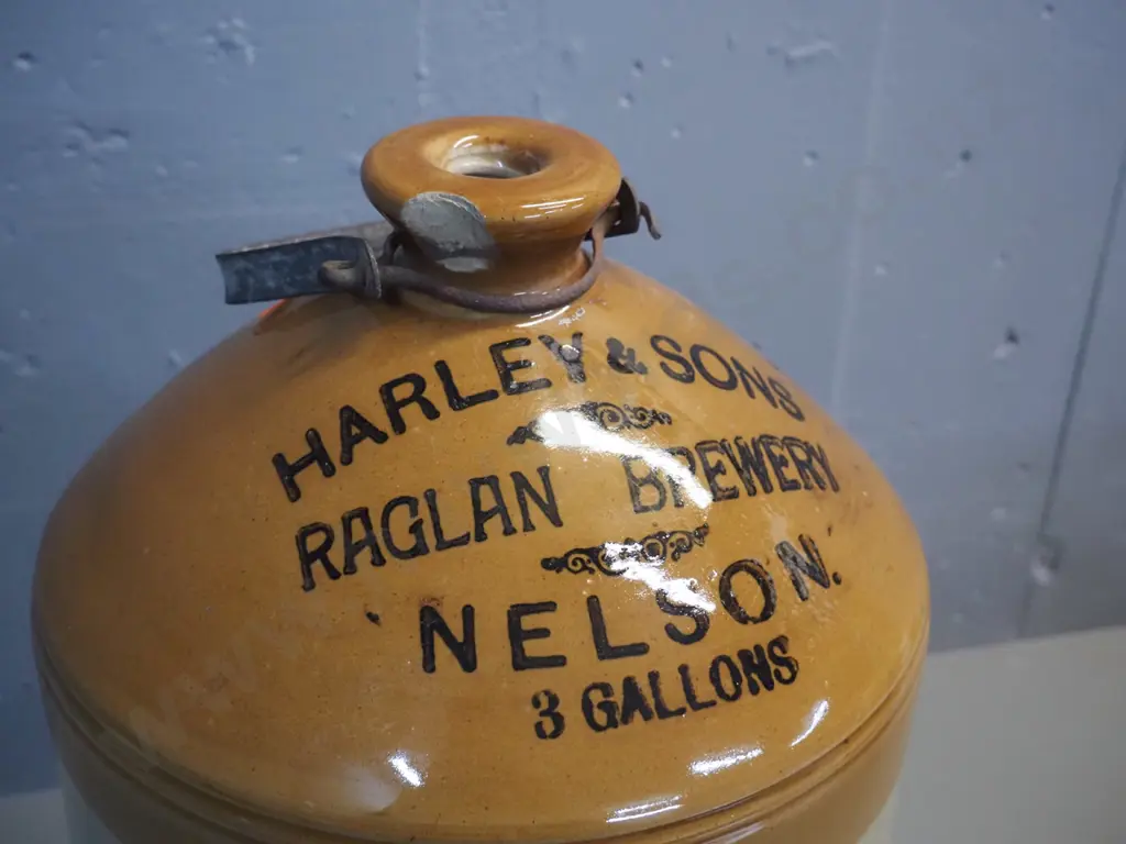 large narrow-mouth stoneware crock w/ metal handle - marked Harley & Sons Raglan Brewery, Nelson - chip at mouth Image 1++
