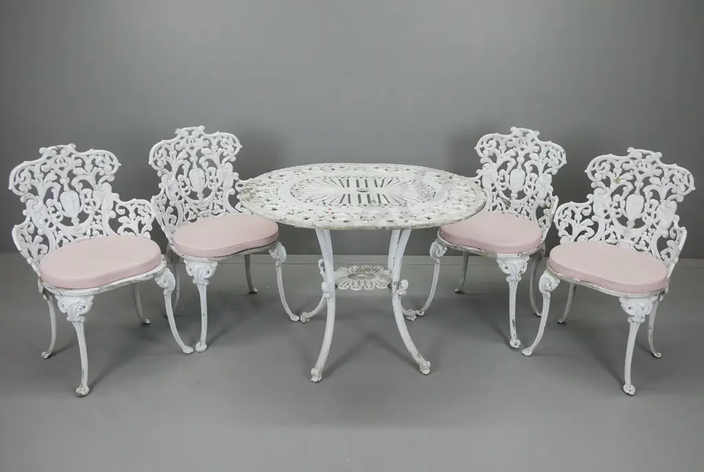 heavy cast alloy white painted outdoor table and 4 chairs w/cushions. Table H690 W520 L780 Image 1++