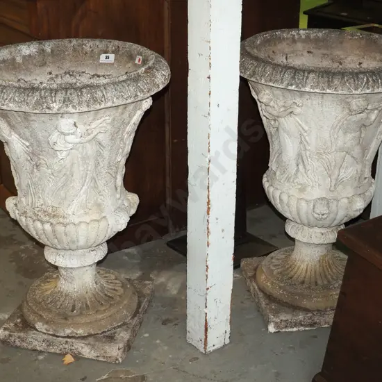 pair of classical style concrete garden urns on fluted base with cavorting maidens in relief H-830 Diam-580