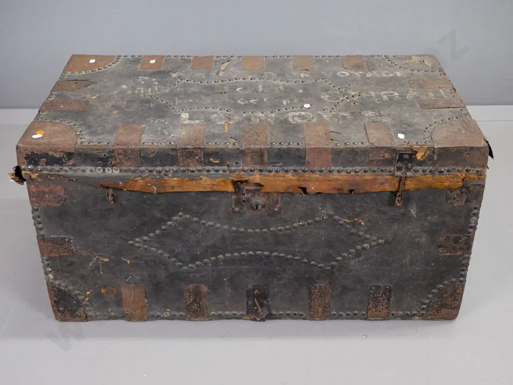 vintage timber trunk covered in leather w/ brass studs, metal strapping - label Portmanteans Trunk - John Weir Saddlers Image 1++