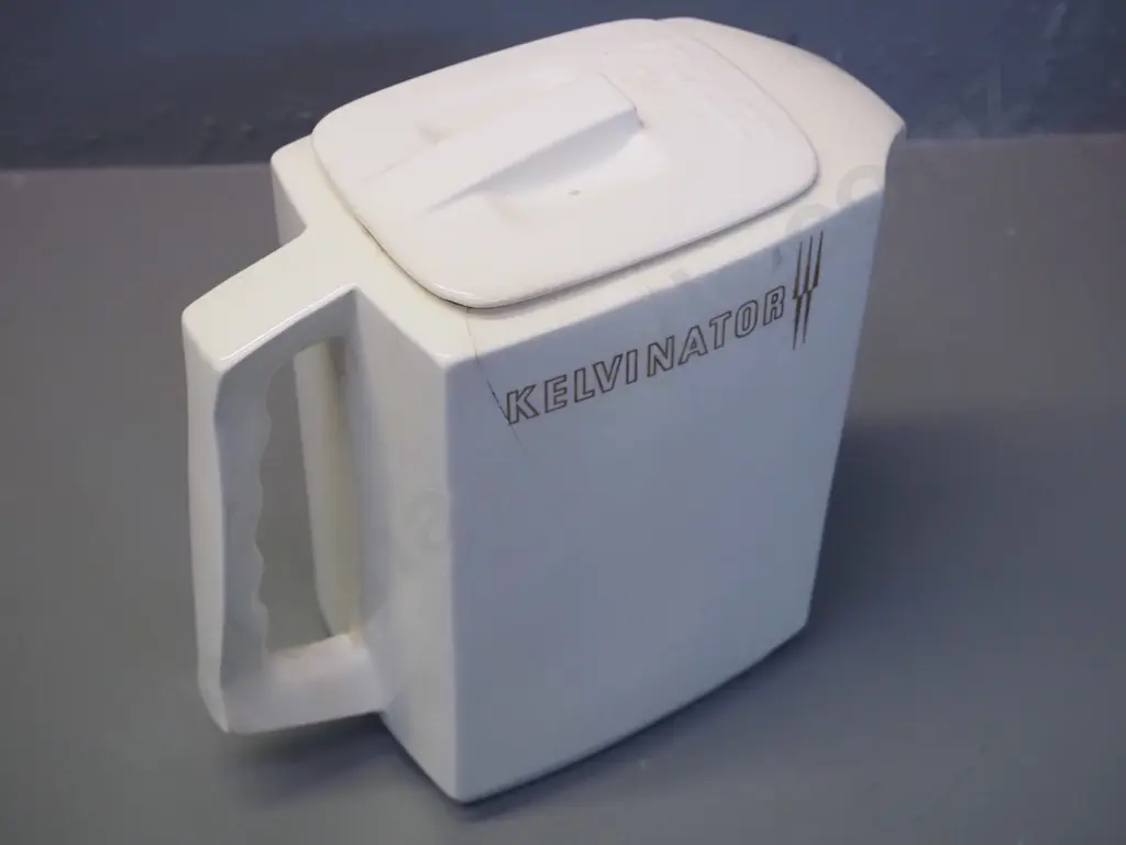Crown Lynn Kelvinator fridge jug with hairline cracks around rim, crazing overall, lid not a perfect fit. H-210 Image 1++
