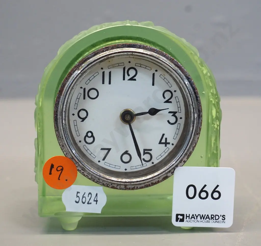vintage green uranium glass clock with moulded flower pattern - some corrosion to chrome clock front H85 W75 Image 1++
