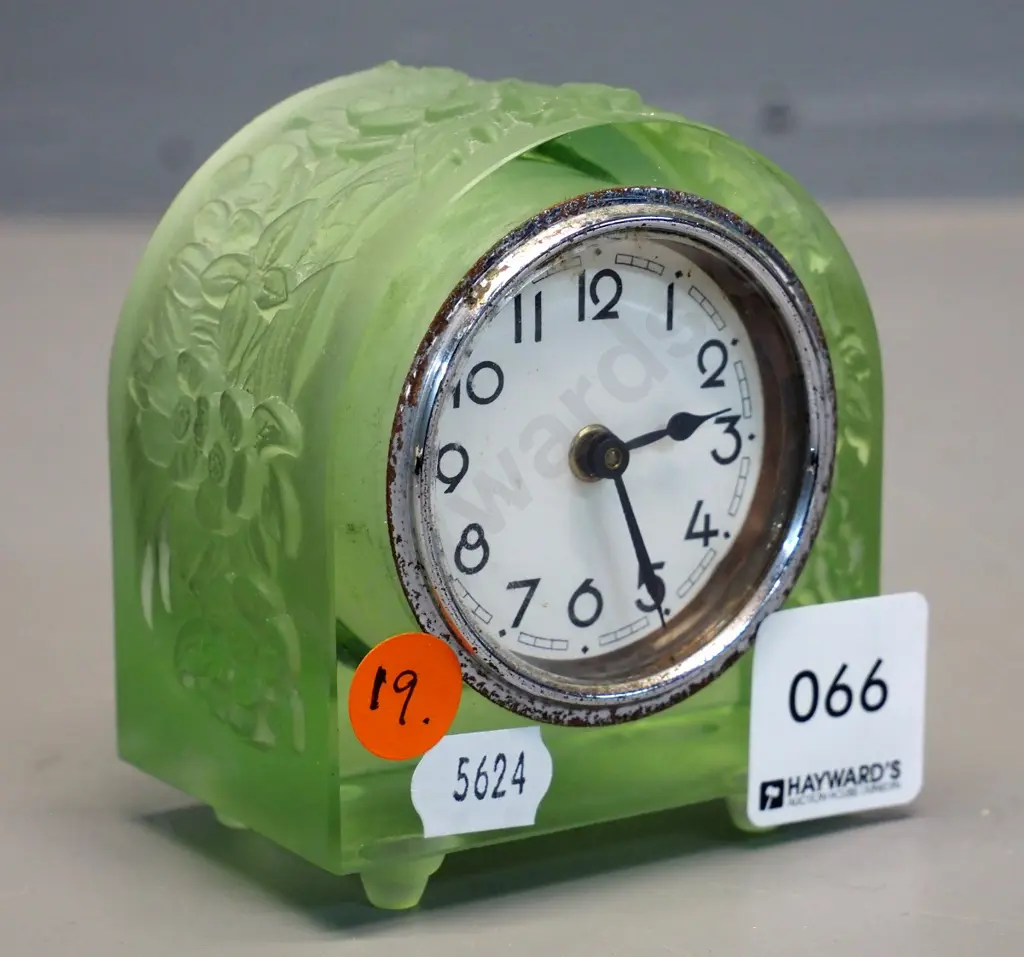vintage green uranium glass clock with moulded flower pattern - some corrosion to chrome clock front H85 W75 Image 1++