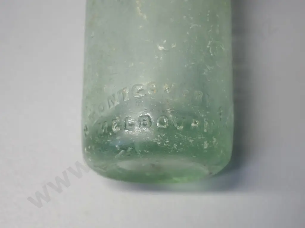 vintage green glass marble bottle - S H Wilson - Beach Street Port Chalmers, chip under rim H-225 Also marked Montgomery Image 1++