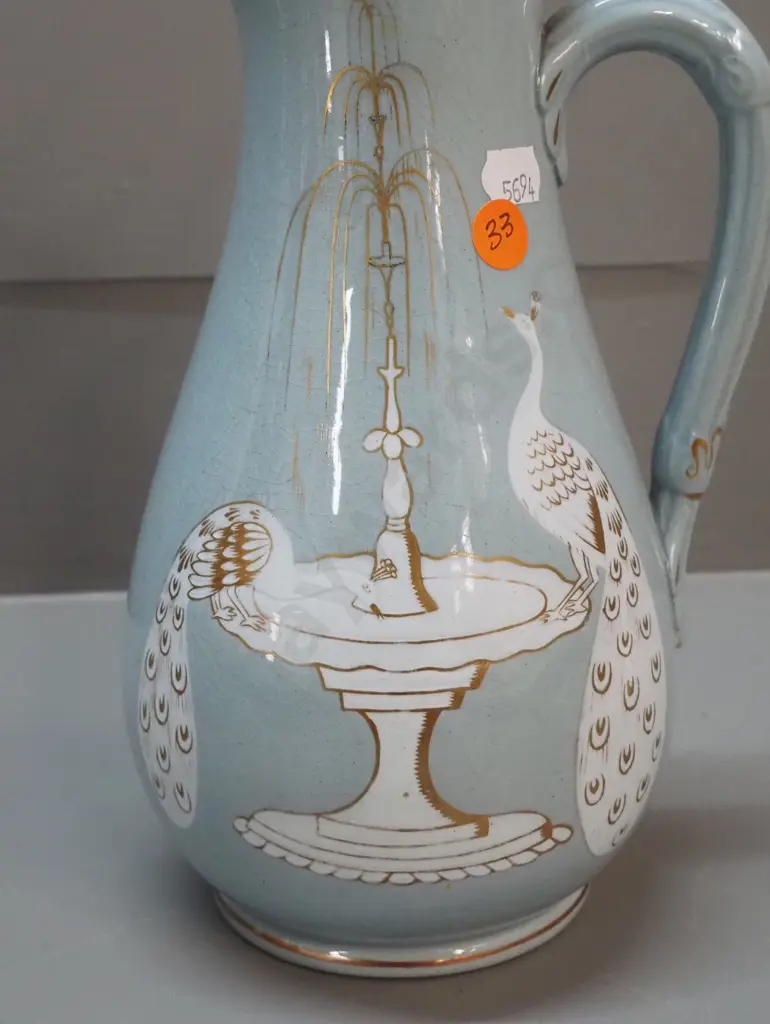 Victorian jug with pewter lid, peacock and fountain decoration, marked T&R Boote Patent Mosaic H-270. Discolouration to Image 1++