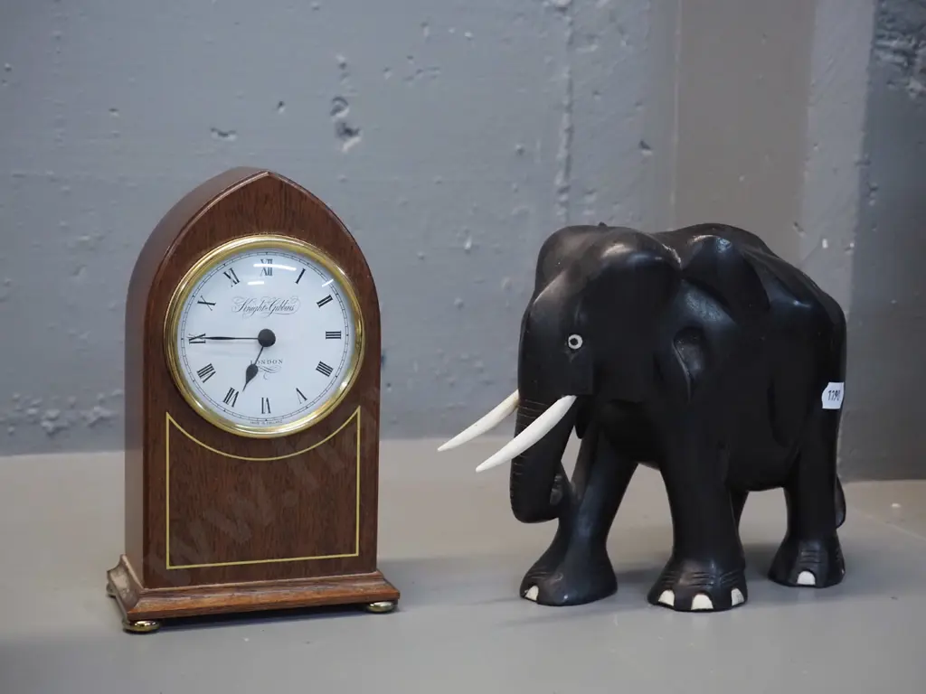 mahogany cased small mantel clock Knight & Gibbins w/ battery quartz movement, H175 and an ebony elephant H-150 L-200 Image 1++