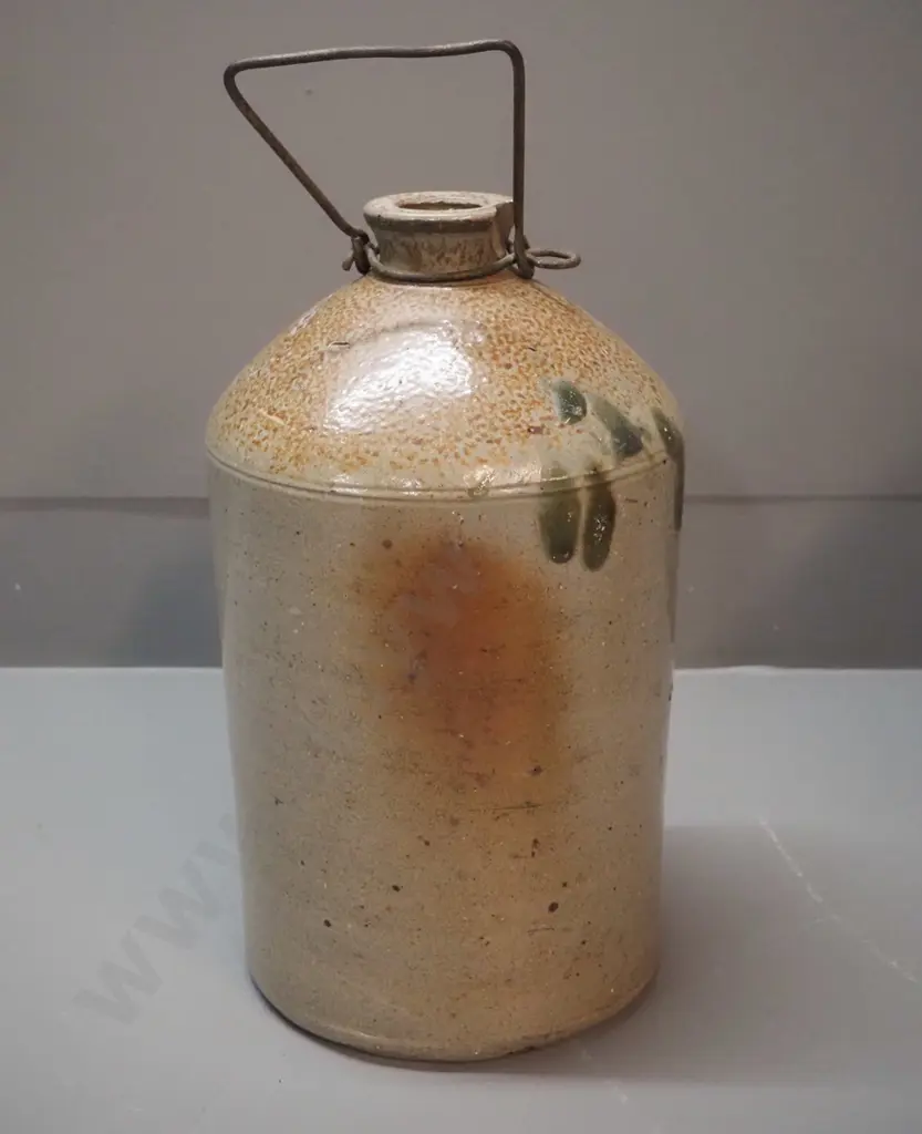 small narrow-mouth stoneware crock with wire handle - marked Clutha Cordial Co. Balclutha, small chip to mouth H320 D180 Image 1++