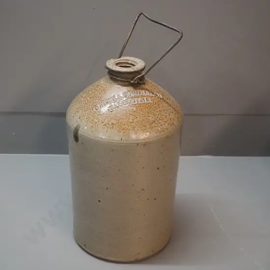 small narrow-mouth stoneware crock with wire handle - marked Clutha Cordial Co. Balclutha, small chip to mouth H320 D180
