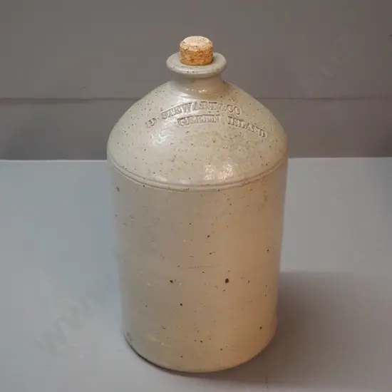 small narrow-mouth stoneware crock with cork stopper - marked D. Stewart & Co Green Island - chip to mouth H-330 D-180