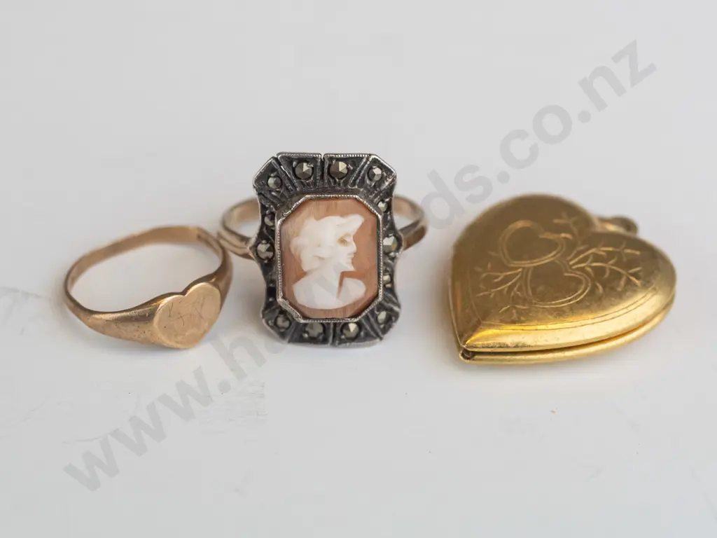 9c shield engraved ring, 9ct silverhead cameo marcasite ring [both small size] & gold plated heart locket no chain Image 1++