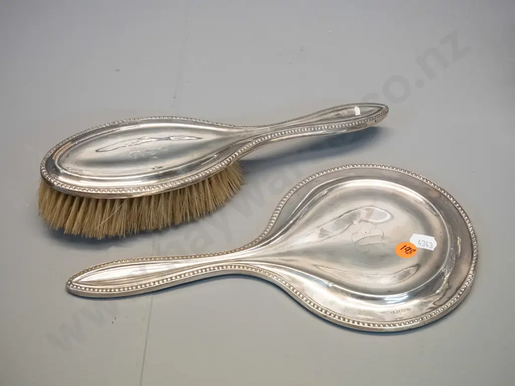 sterling silver dressing table mirror and brush - both monogrammed AJ, mirror is L-270, has adhesive residue on glass Image 1++