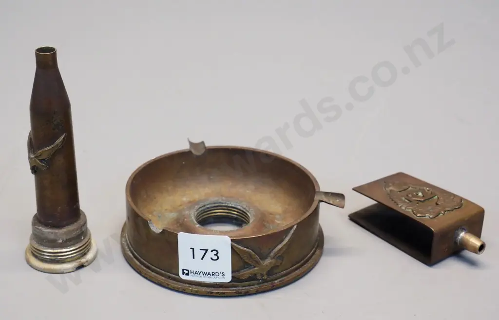 vintage brass ashtray and matchbox holder made from shell casings with NZ Infantry logo - one cigarette holder missing Image 1++