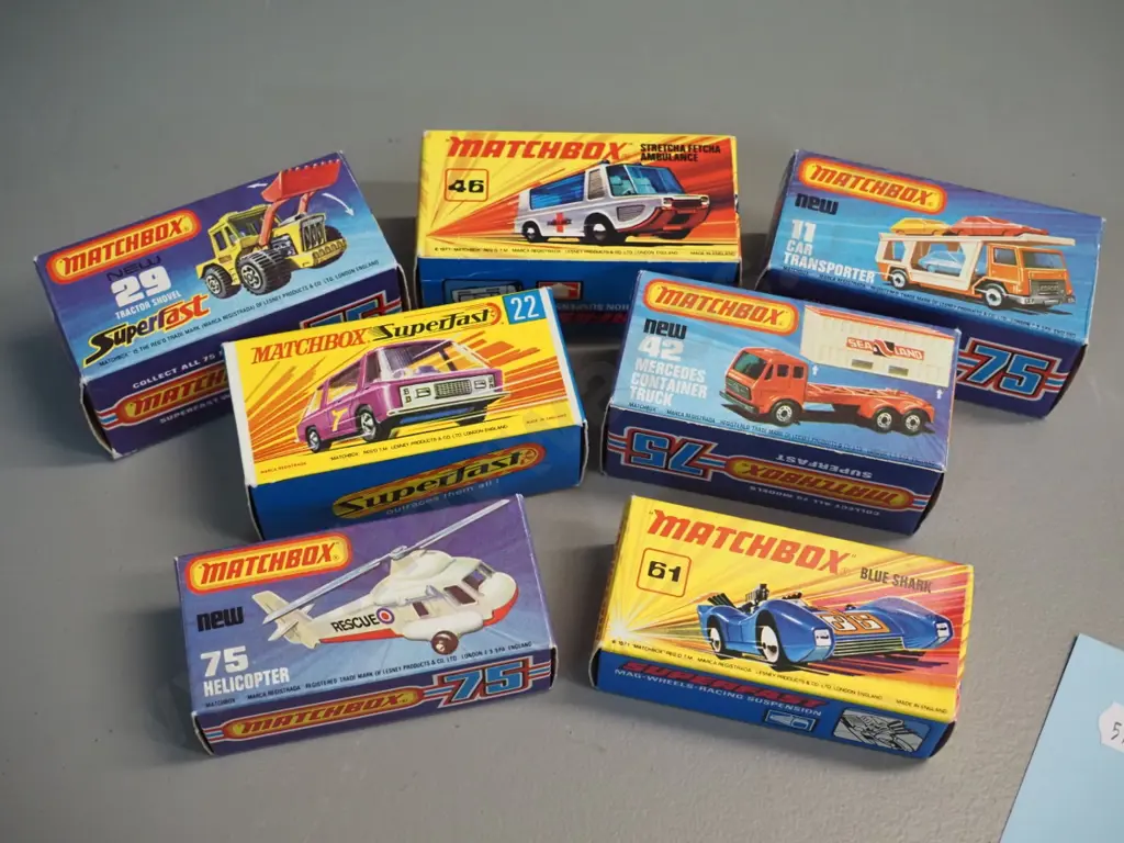7 Matchbox vehicles in original boxes -  assorted Superfast cars, helicopter, transporter, etc. Image 1++