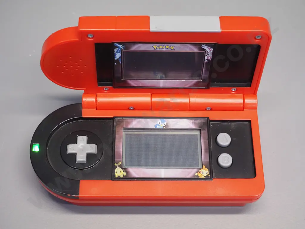 hand held folding Pokemon game - made by Jakks Pacific. Powers up, game not tested otherwise. Image 1++