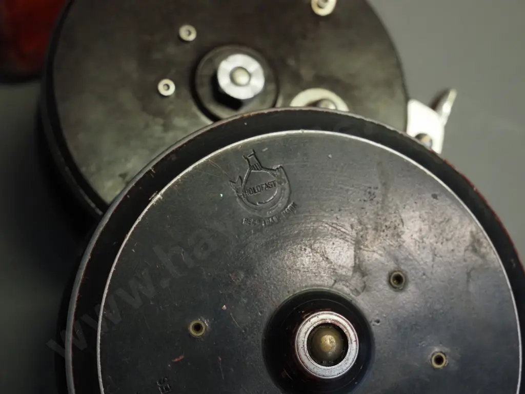 2 English spinngin reels - Bakelite and metal Alcock Aerialite in original box and a C. Farlow 4" fly reel Image 1++