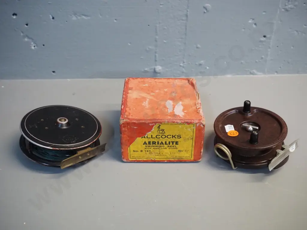 2 English spinngin reels - Bakelite and metal Alcock Aerialite in original box and a C. Farlow 4" fly reel Image 1++