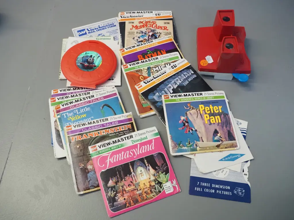 retro red and white Viewmaster with numerous reels Image 1++