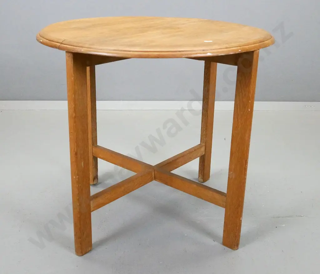 round oak occasional table, having four legs on x-frame base, crack and water stains to top Image 1++