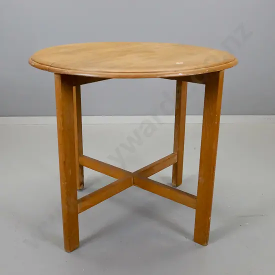 round oak occasional table, having four legs on x-frame base, crack and water stains to top