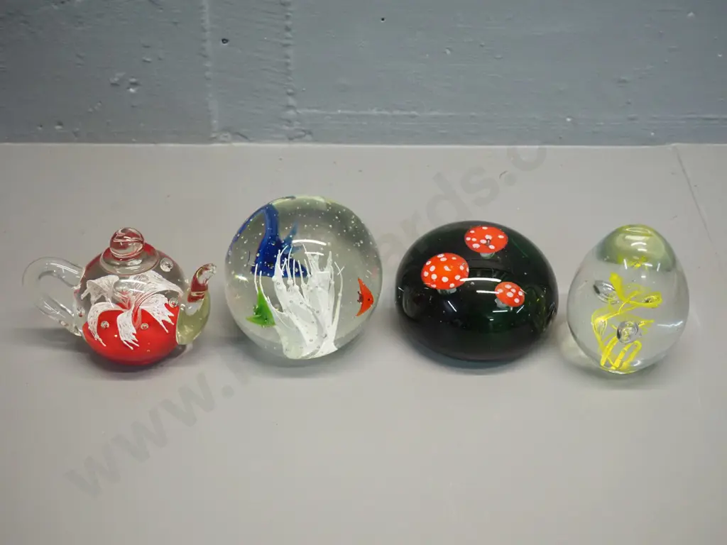 4 glass paperweights - toadstools D-90, teapot, tropical fish with coral motif, and yellow swirl Image 1++