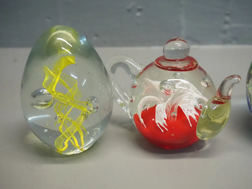 4 glass paperweights - toadstools D-90, teapot, tropical fish with coral motif, and yellow swirl Image 1++