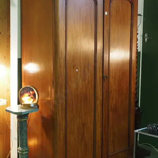 victorian mahogany fitted wardrobe w/ two arched doors, one side hanging space, shoe drawer, linen shelves, boot storage