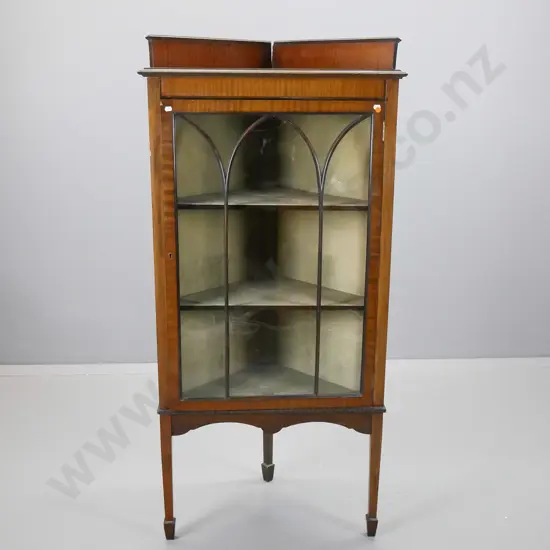 vintage walnut corner cupboard on stand having astral glazed door , crack to central glass panel