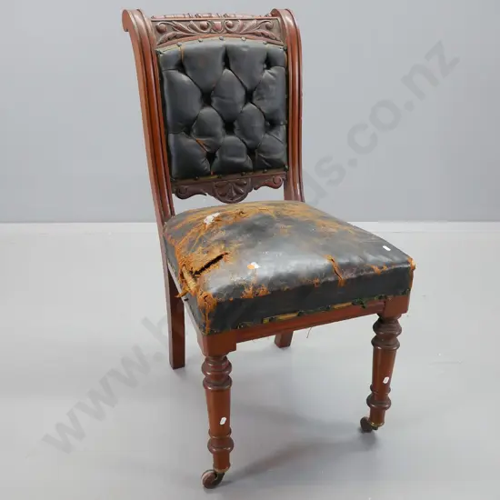 Cromwellian style dining chair in walnut, deep button leather back, torn leather seat, on turned legs