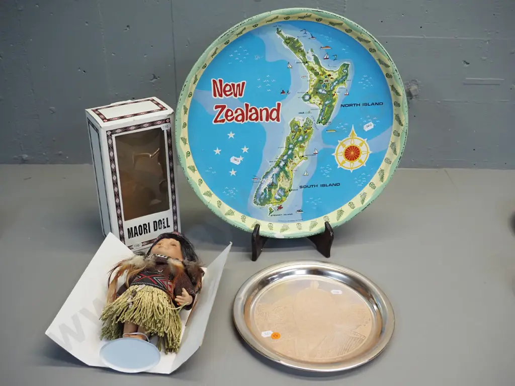 New Zealand souvenir ware - 2 trays and a Maori doll in original packaging. Scratches and wear to trays, larger is D390 Image 1++