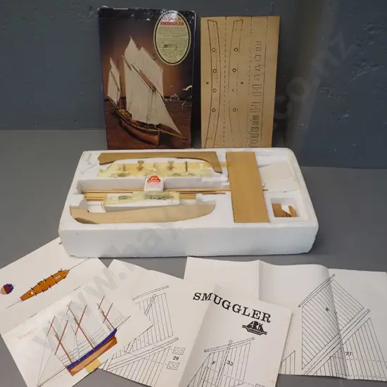 yet-to-be-assembled Ark Models timber model ship kit - lug-rigged ship Smuggler - only top of original box remains