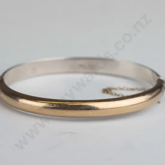 bangle with safety chain stamped 9ct stg sil