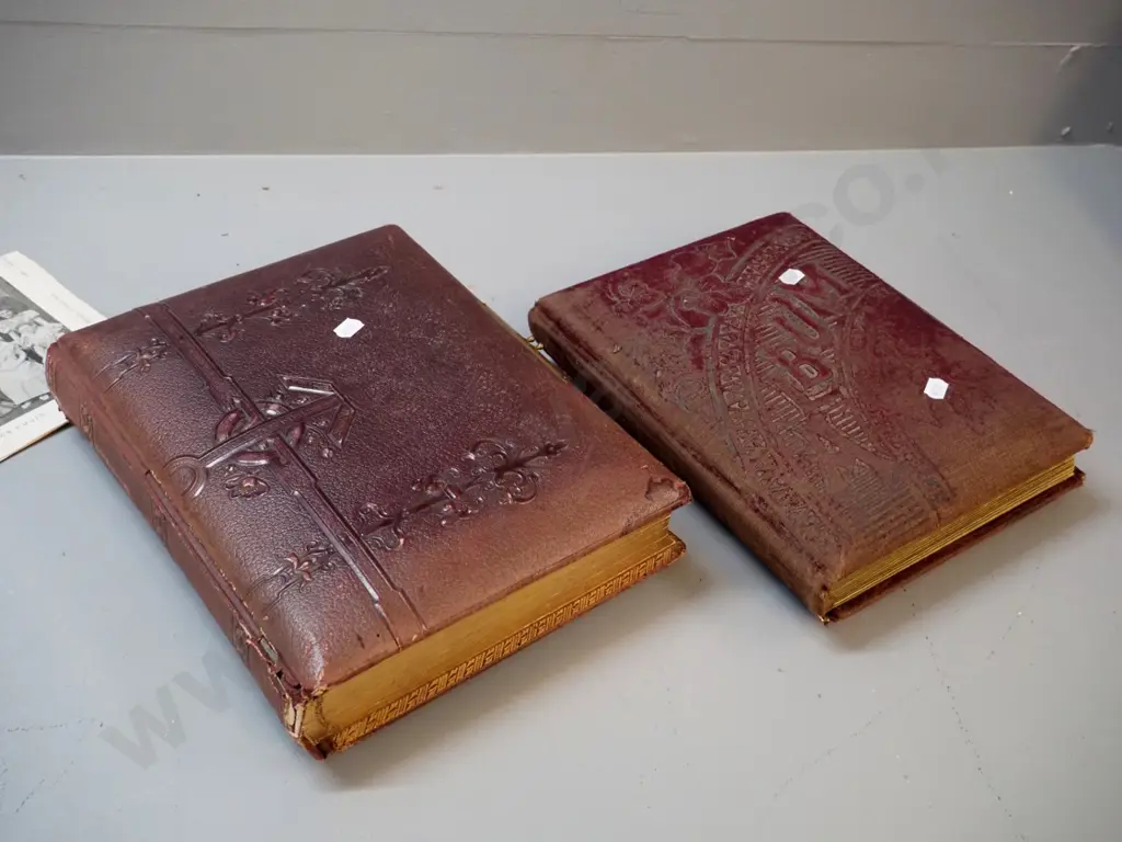 2 antique photo albums with numerous portrait & group photographs, some loose photos and memorial cards. Both missing Image 1++