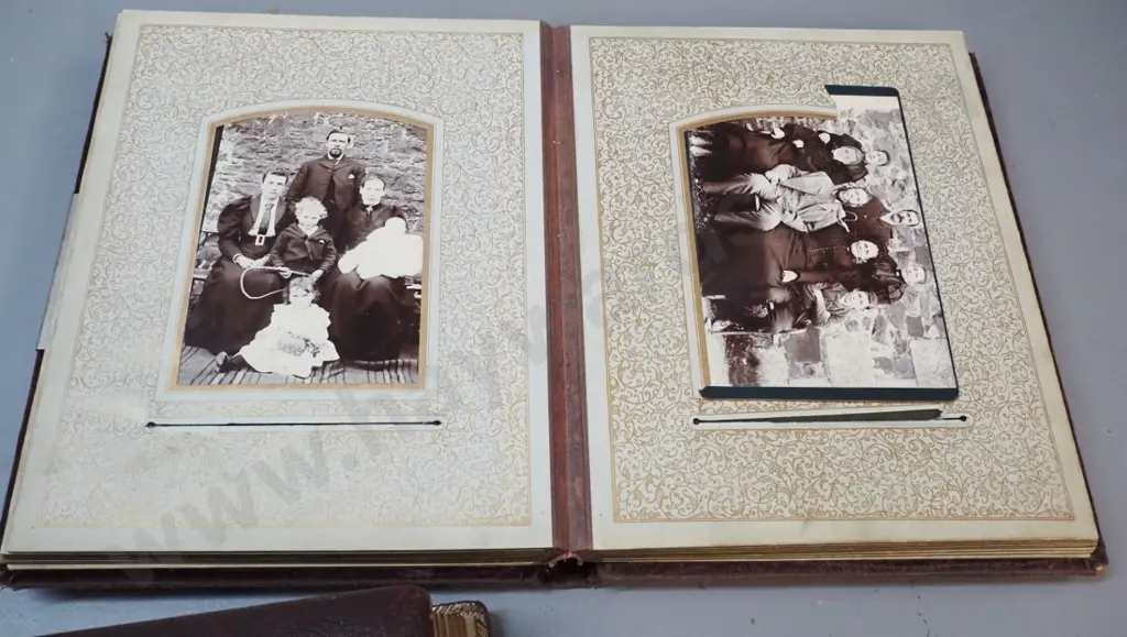 2 antique photo albums with numerous portrait & group photographs, some loose photos and memorial cards. Both missing Image 1++