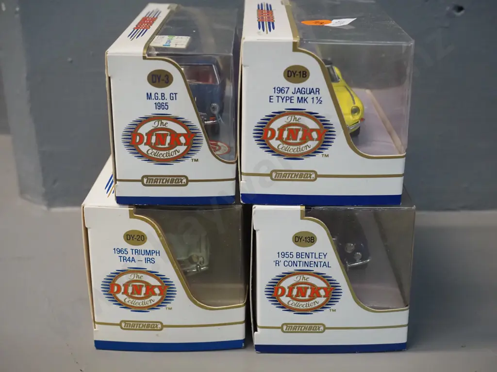 4 boxed Dinky die-cast 1:43 scale model vehicles - 1967 Jaguar E-type, 1965 Triumph TR4A, 1965 MGB GT, 1955 Bentley Image 1++