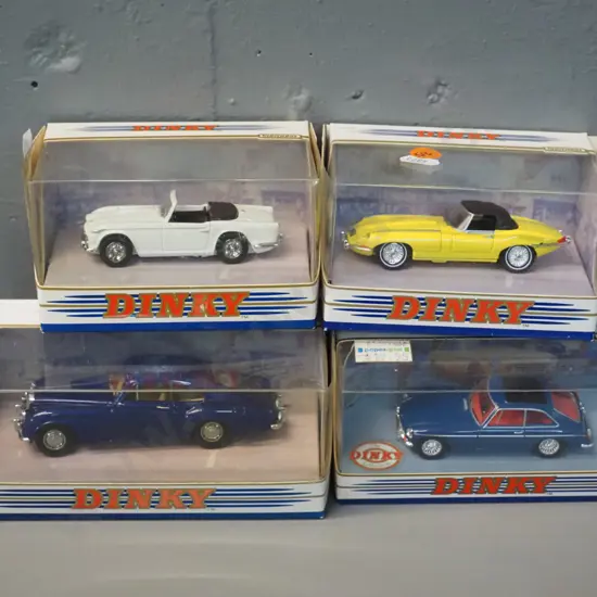 4 boxed Dinky die-cast 1:43 scale model vehicles - 1967 Jaguar E-type, 1965 Triumph TR4A, 1965 MGB GT, 1955 Bentley