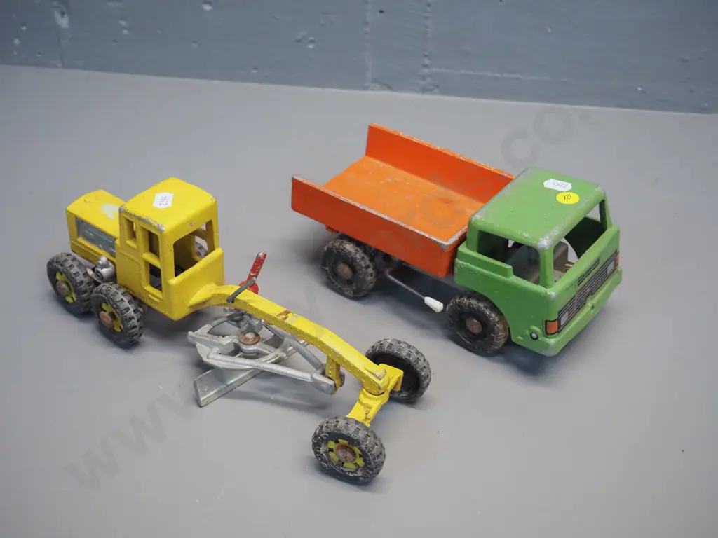 2 Fun Ho die-cast metal vehicles - tip truck with tilting cab and a grader with missing spring from blade mechanism. Image 1++