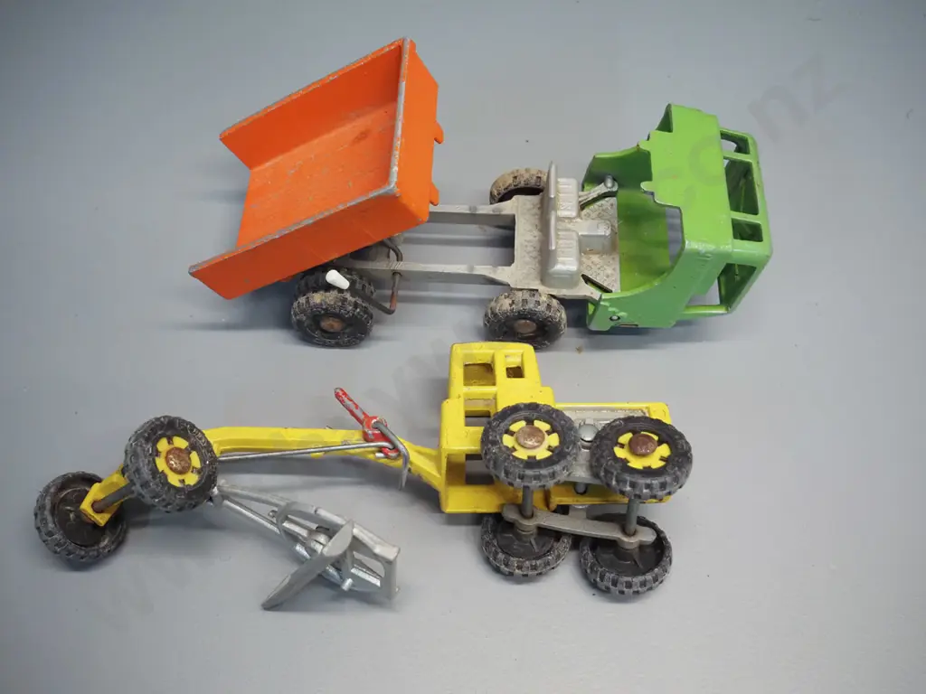 2 Fun Ho die-cast metal vehicles - tip truck with tilting cab and a grader with missing spring from blade mechanism. Image 1++