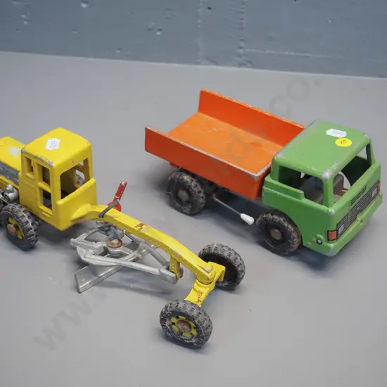 2 Fun Ho die-cast metal vehicles - tip truck with tilting cab and a grader with missing spring from blade mechanism.