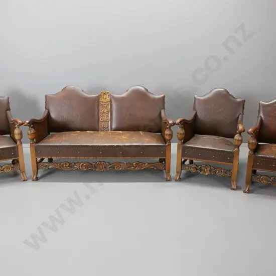 5-piece Spanish style suite in leather and oak, shaped leather backs having embossed armorial,