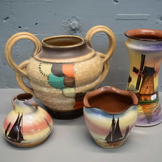 3 pieces Watcombe Torquay ware and a matte glaze deco urn vase. Torquay vase H-210