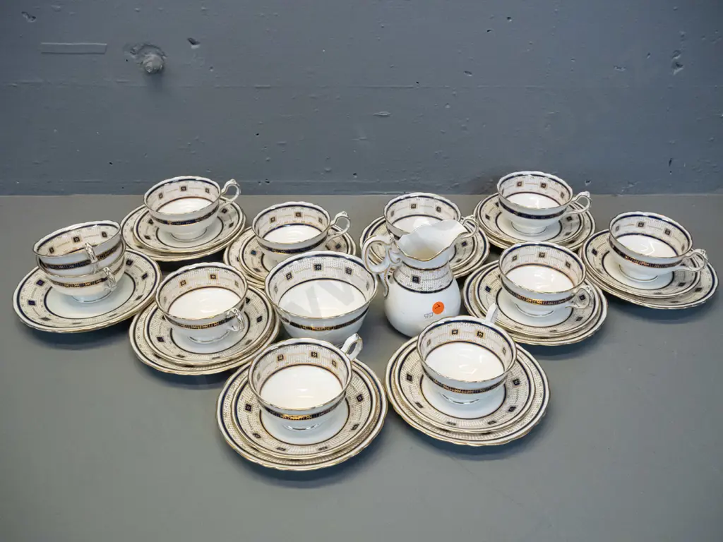 Bisto English china tea ware - 9 trios, cream jug and sugar bowl, 2 spare cups & plates Image 1++